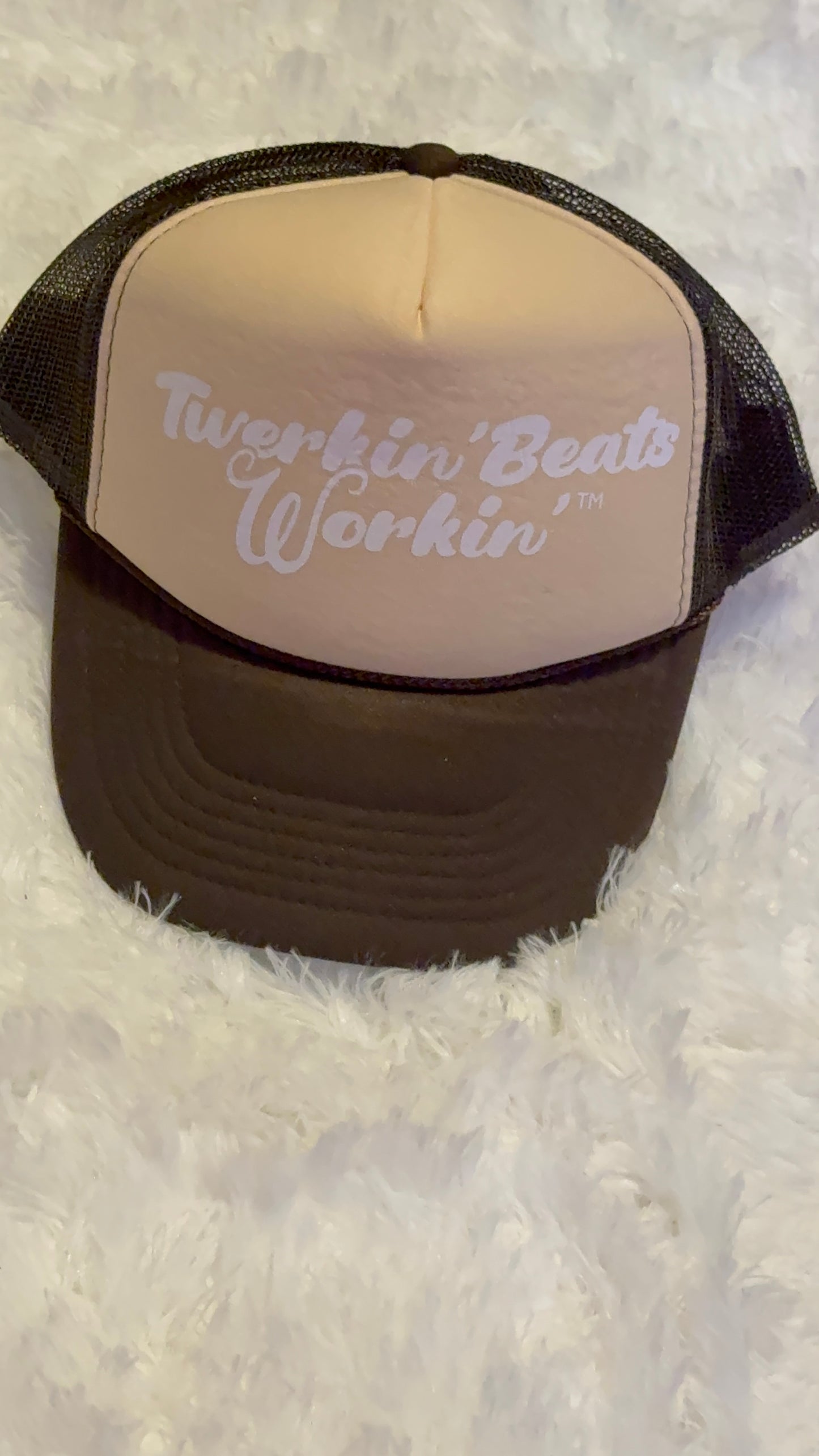 Tan and brown hat with white Twerkin’ Beats Workin’ logo