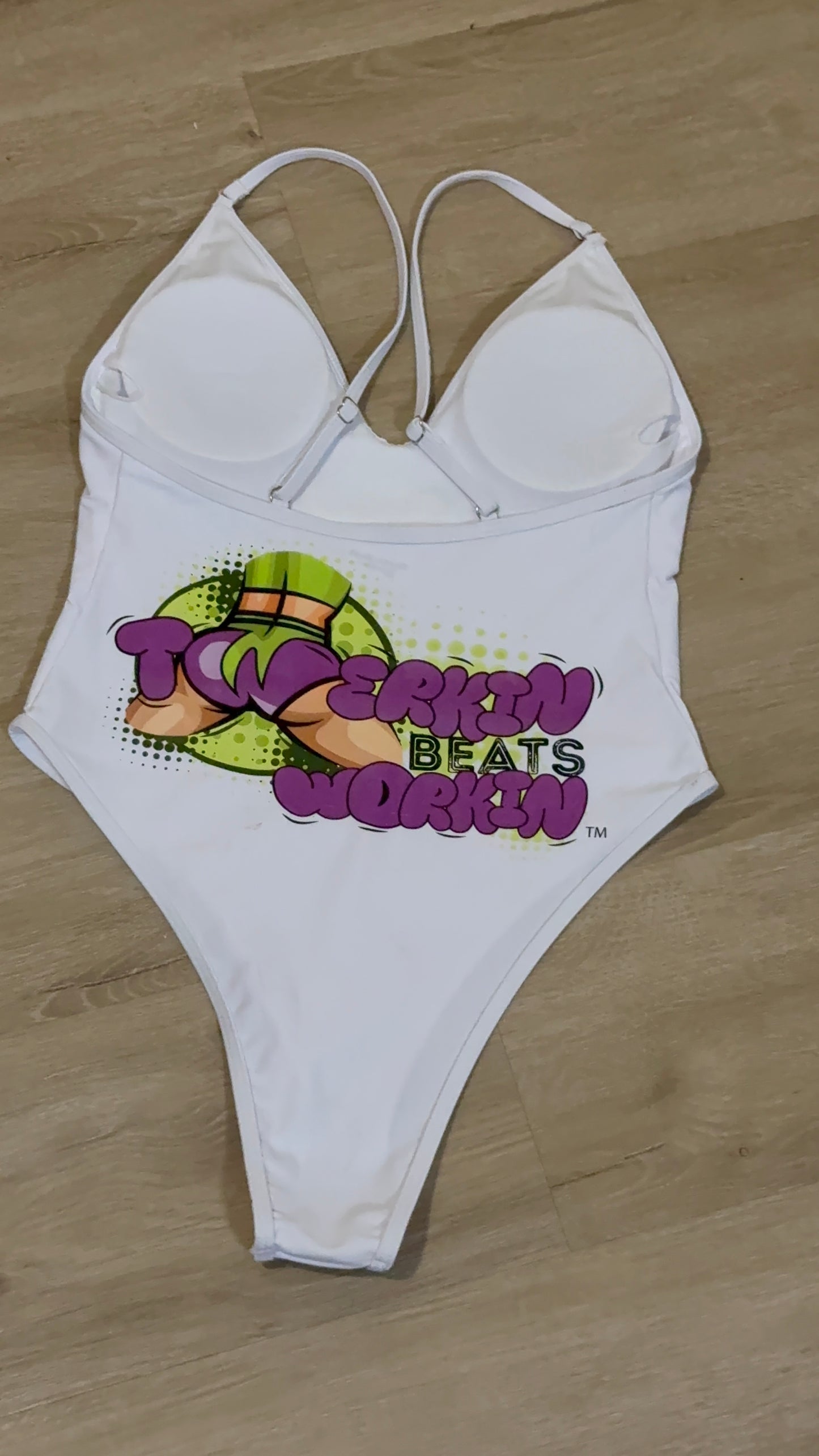 Purple and green booty designed Twerkin’ Beats Workin’ one piece