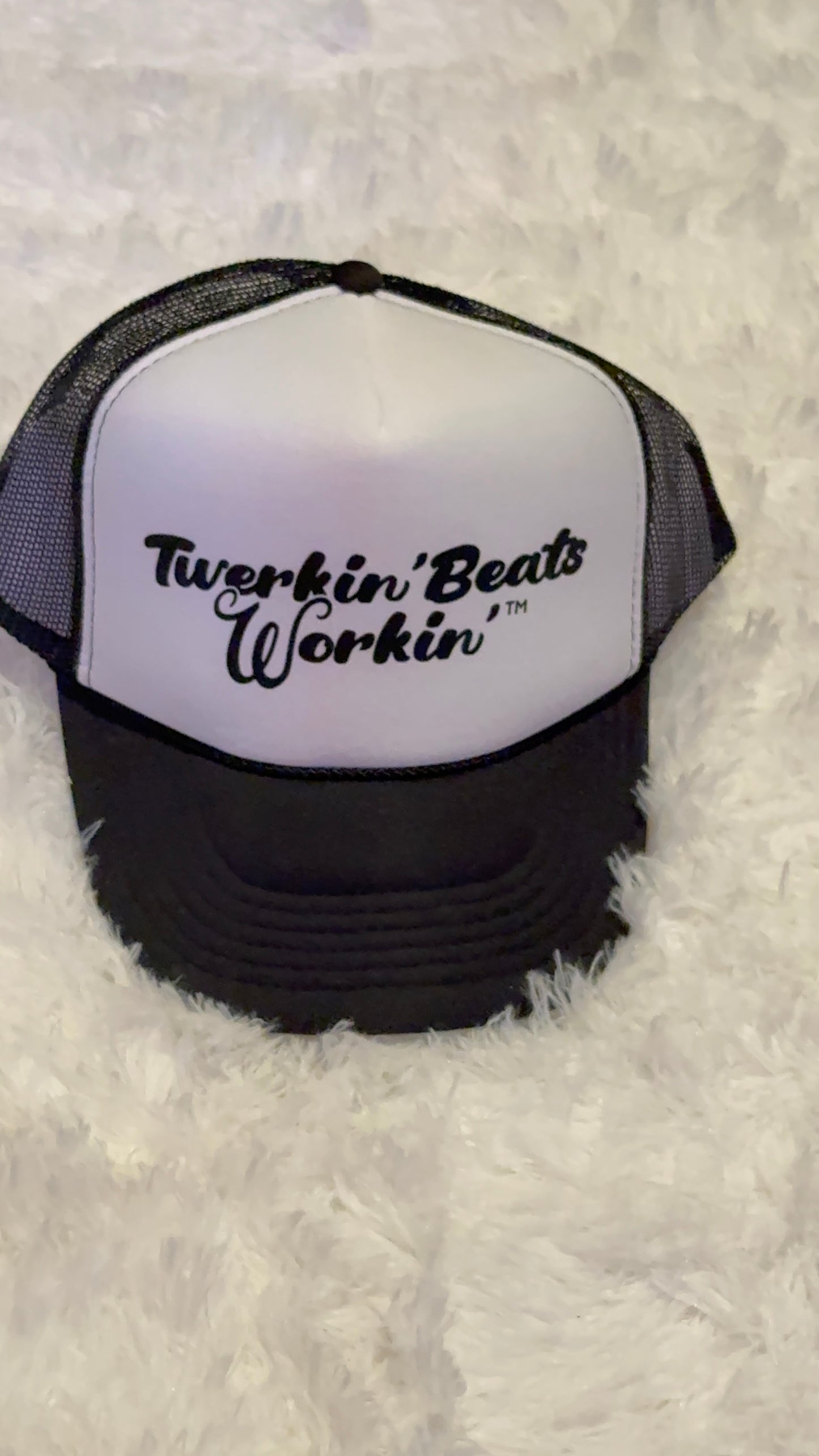 White and black hat with black Twerkin’ Beats Workin’ logo
