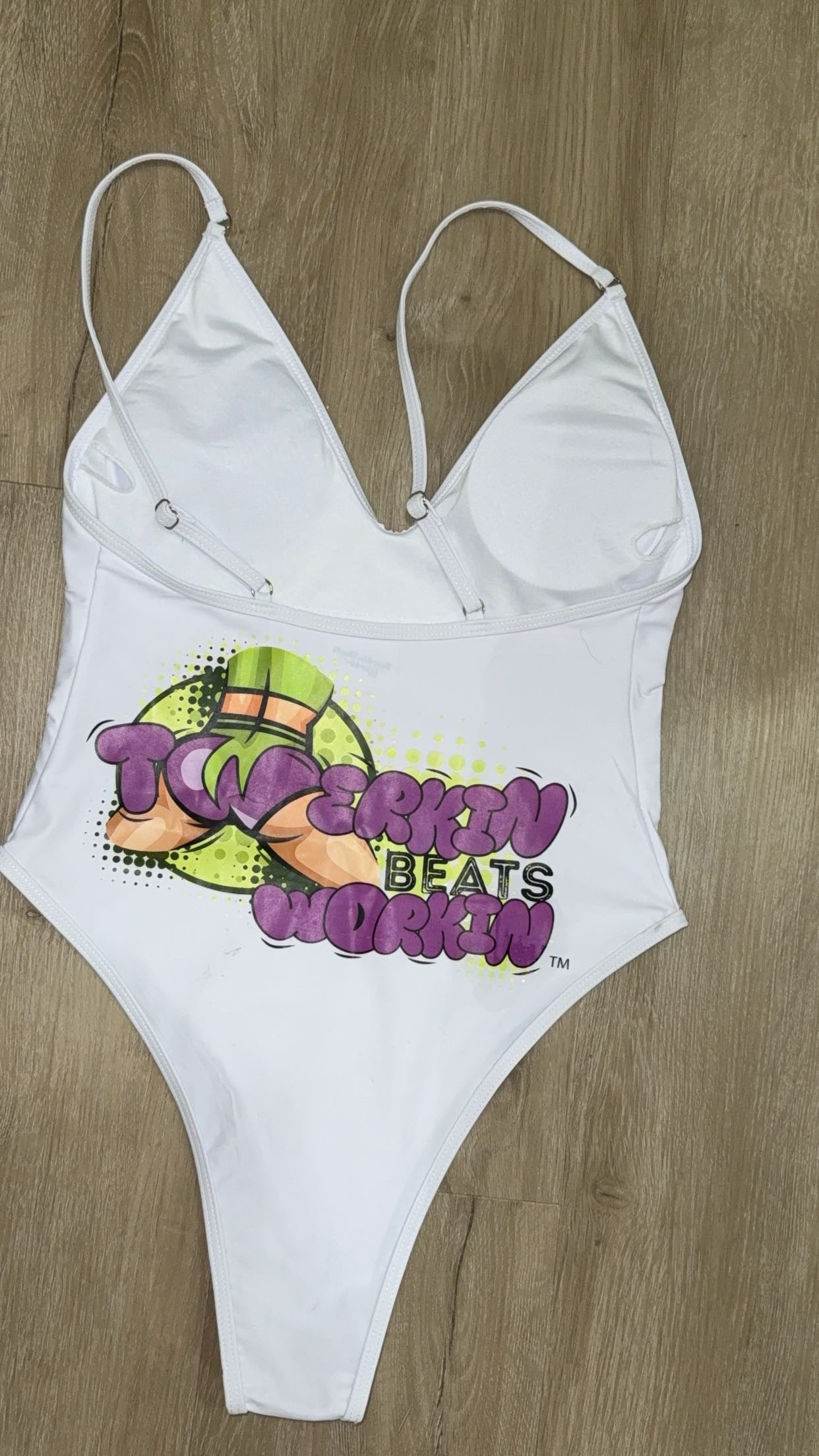 Purple and green booty designed Twerkin’ Beats Workin’ one piece