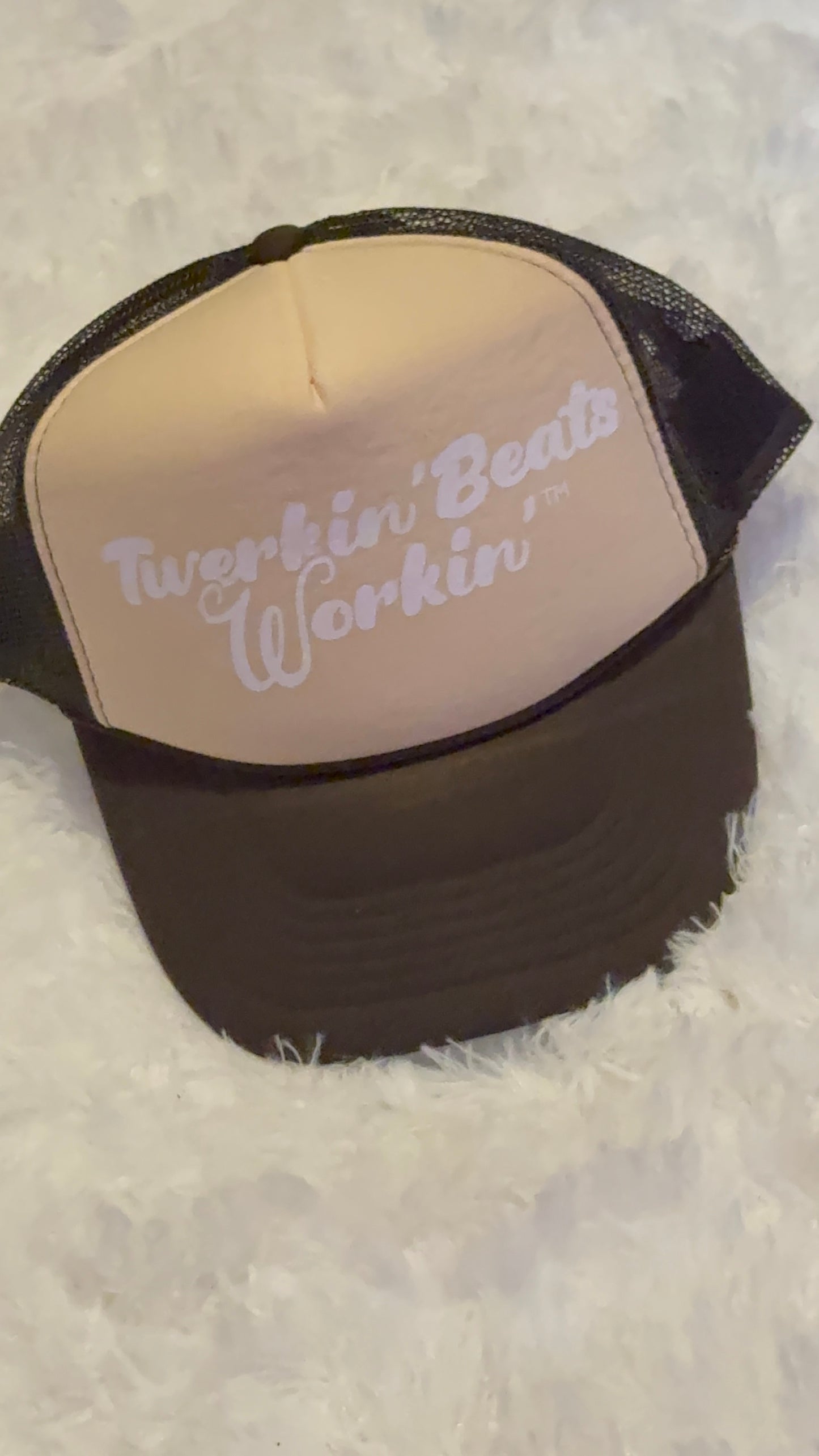 Tan and brown hat with white Twerkin’ Beats Workin’ logo