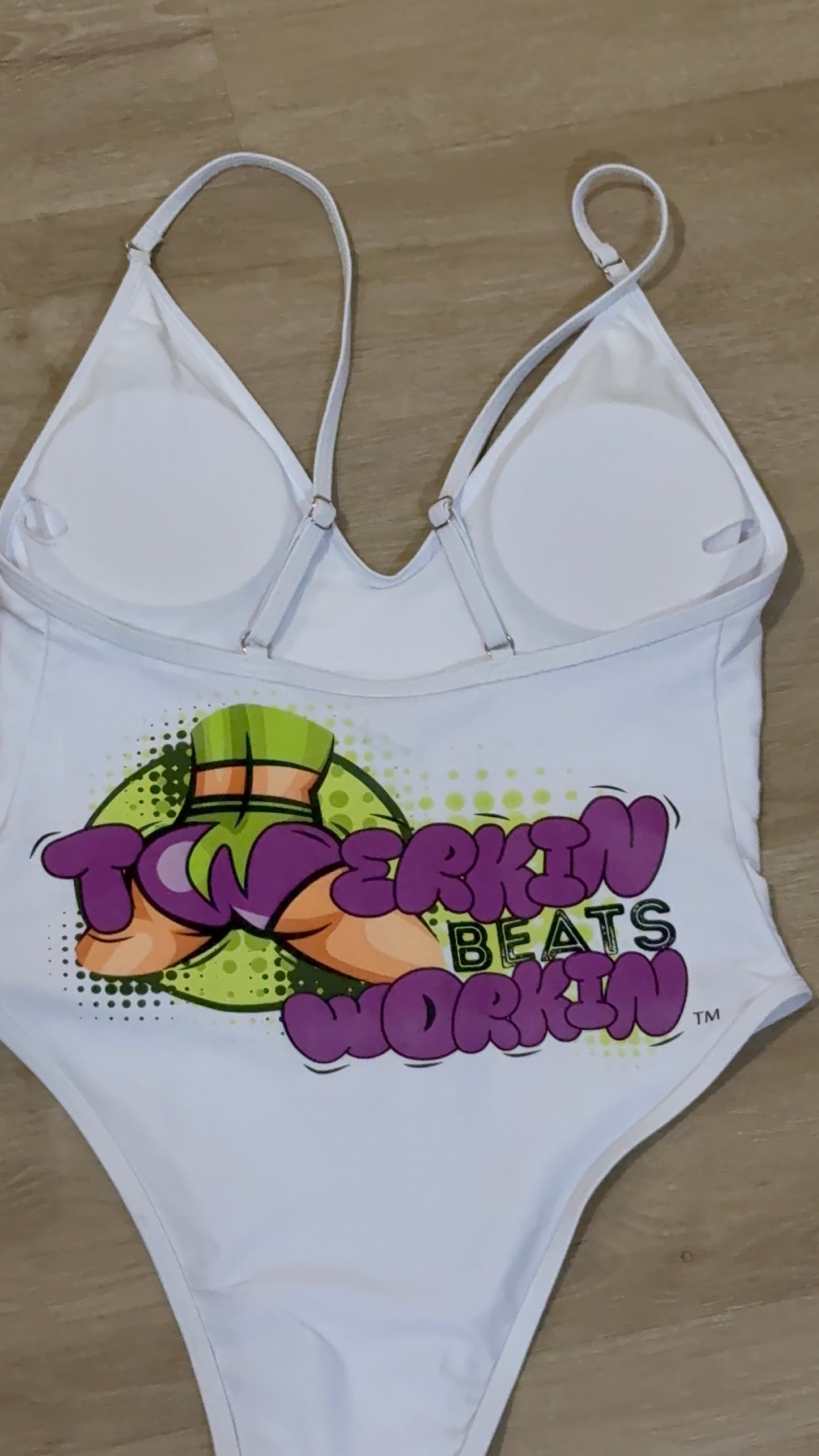 Purple and green booty designed Twerkin’ Beats Workin’ one piece