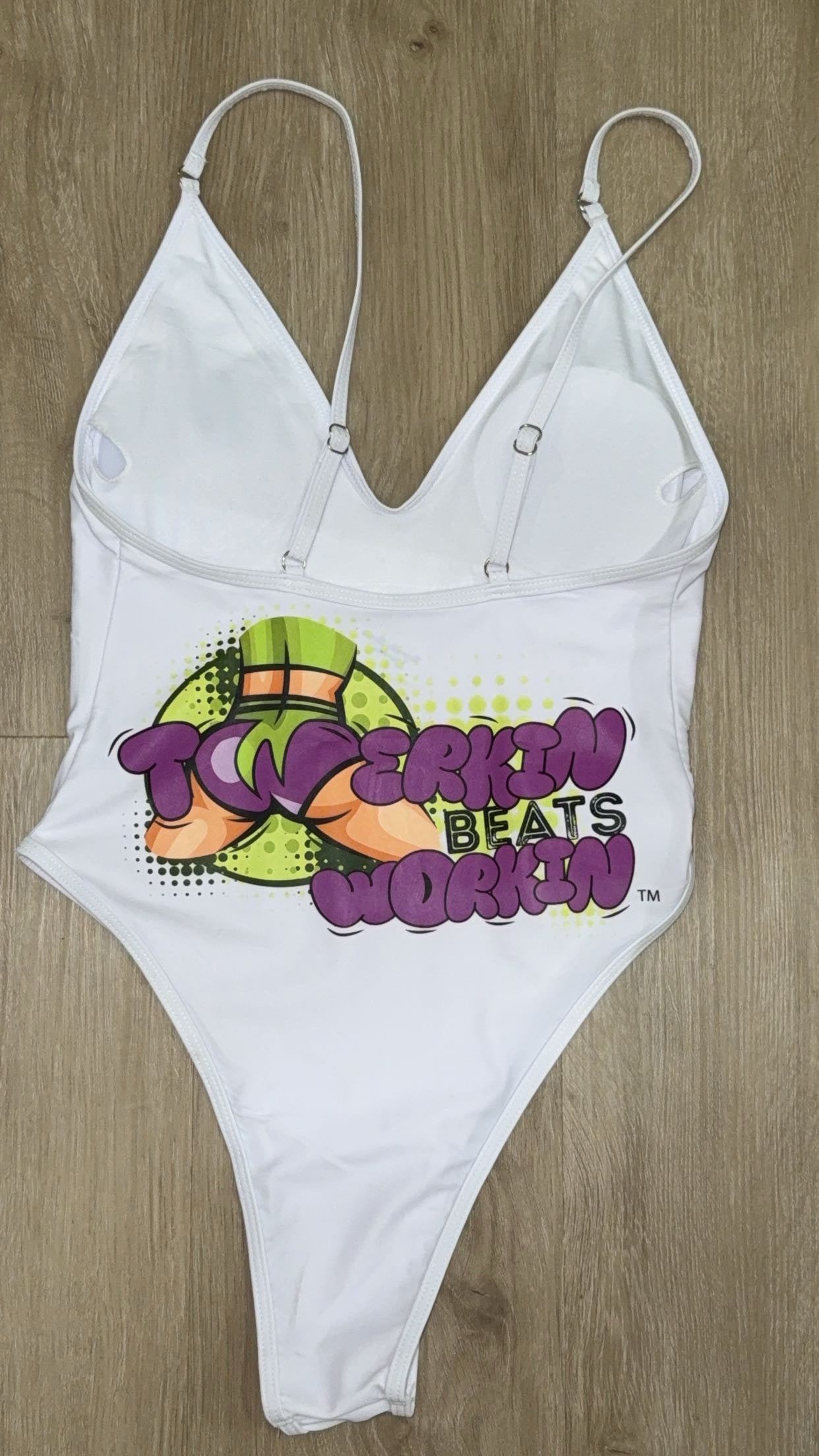 Purple and green booty designed Twerkin’ Beats Workin’ one piece