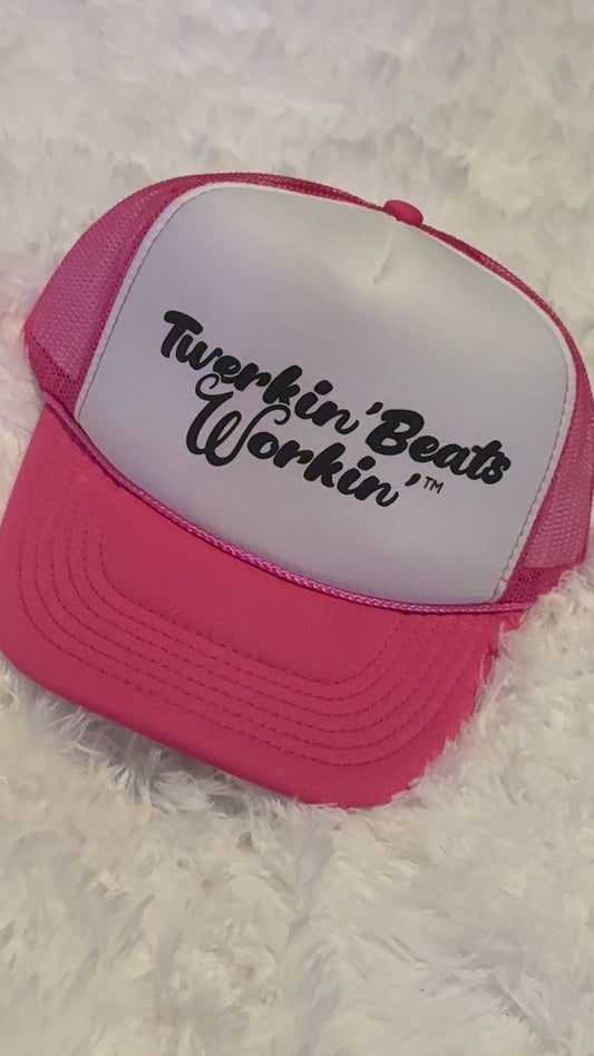 Pink and white with regular Twerkin’ Beats Workin’ in black logo
