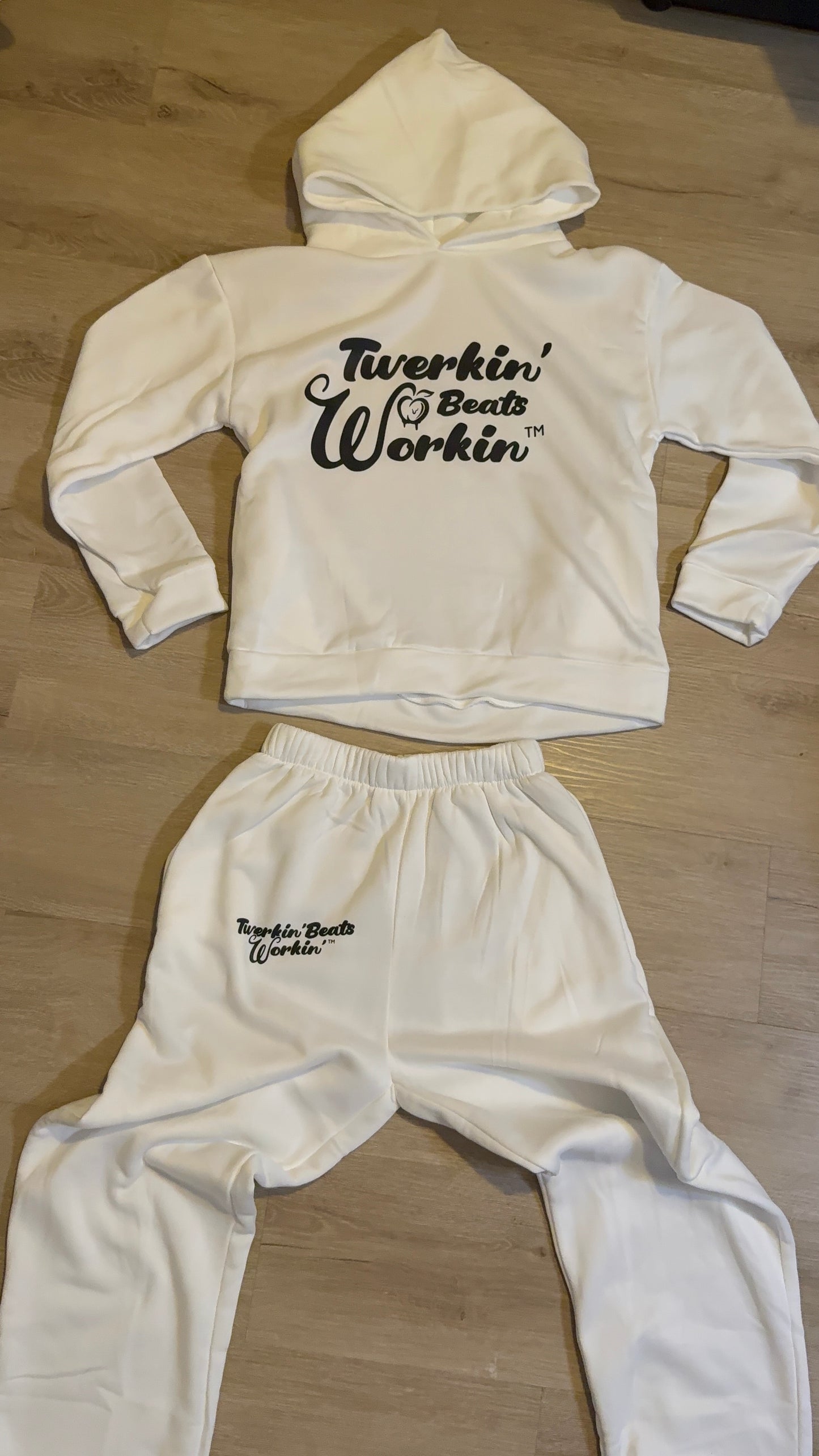 Unisex white Twerkin’ Beats Workin’ peach design on front of hoodie and back of pants Jogger set