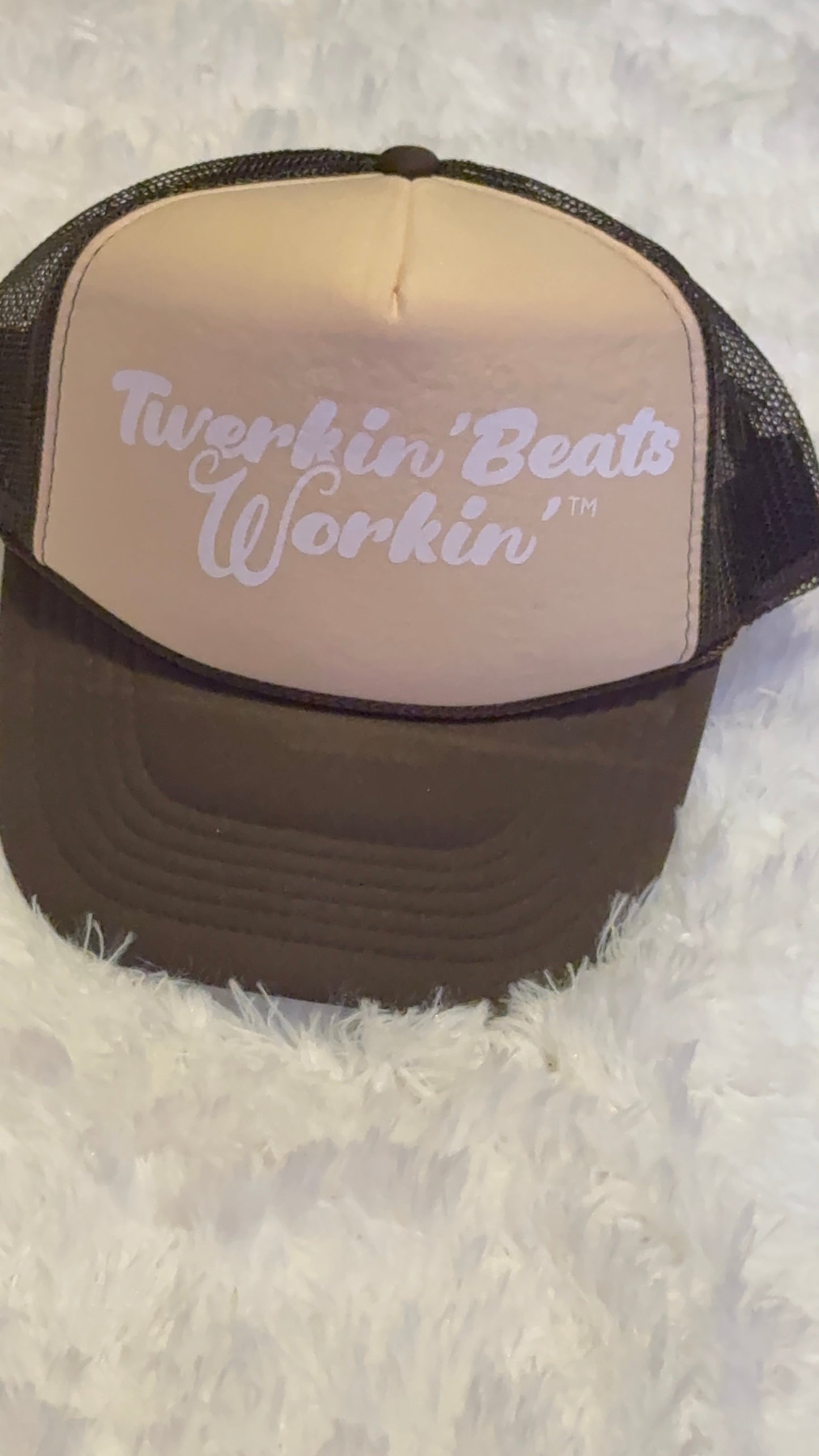 Tan and brown hat with white Twerkin’ Beats Workin’ logo