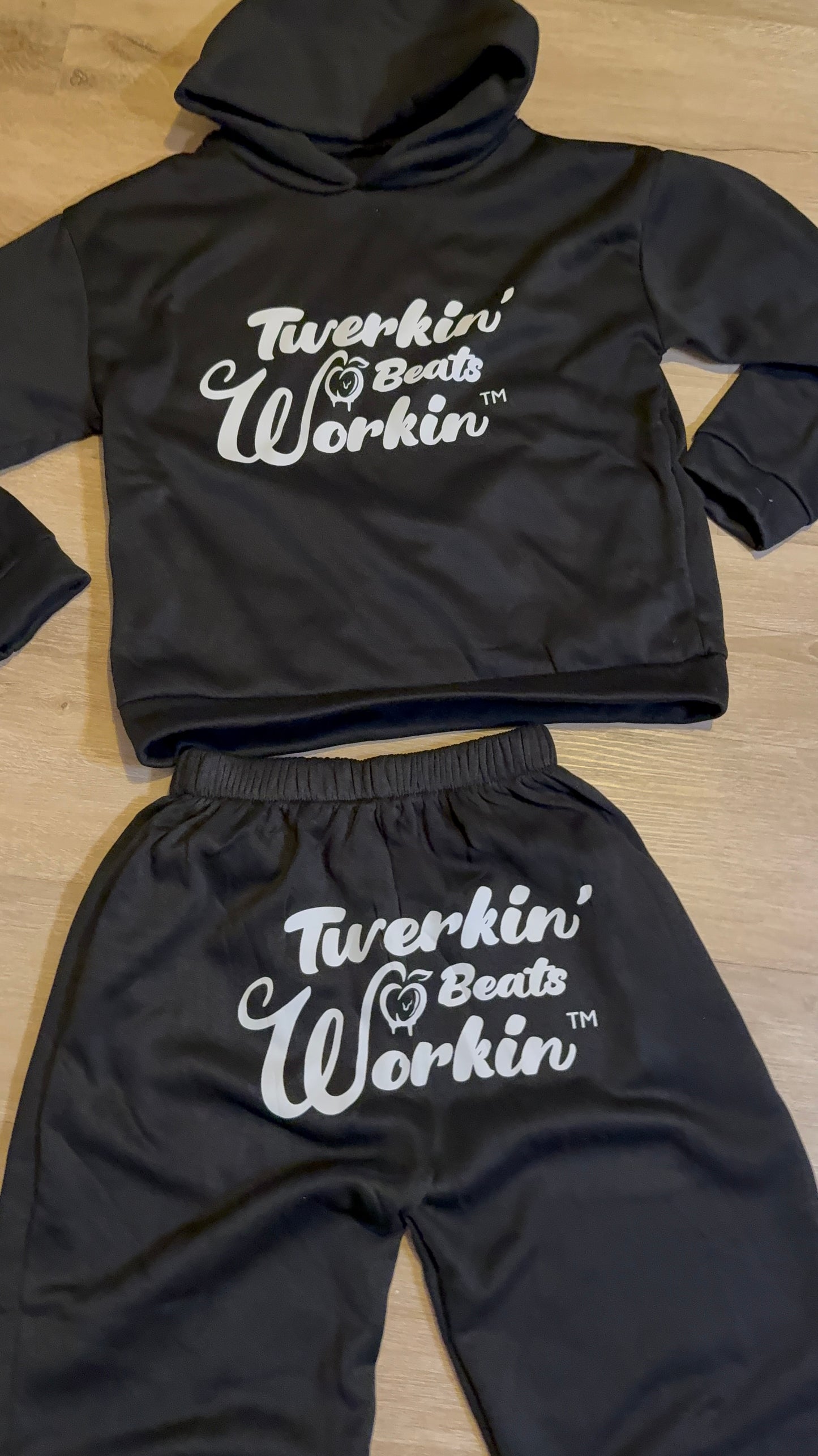 Black Unisex Twerkin’ Beats Workin’ peach design front of hoodie back of pants jogger set