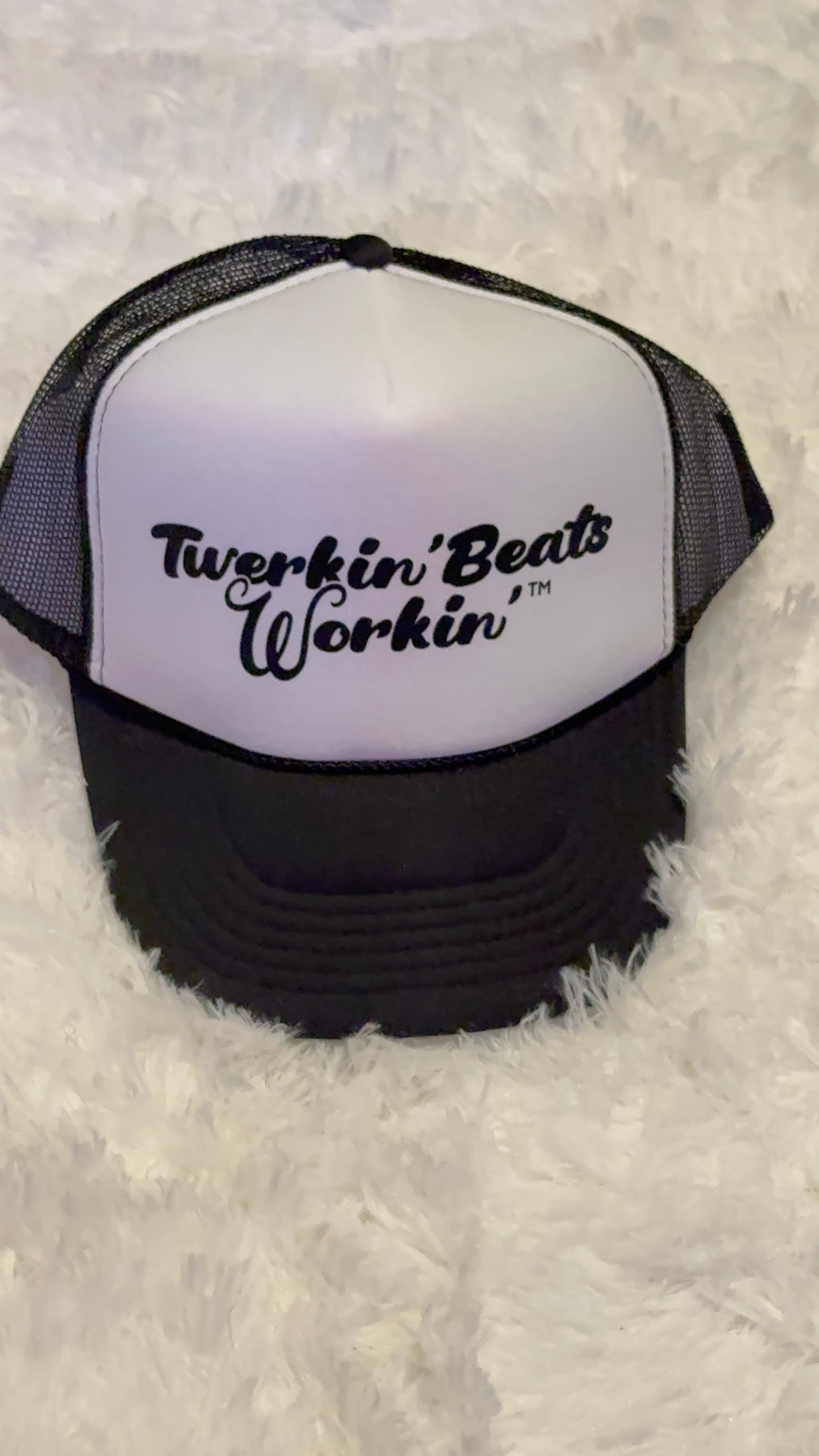White and black hat with black Twerkin’ Beats Workin’ logo