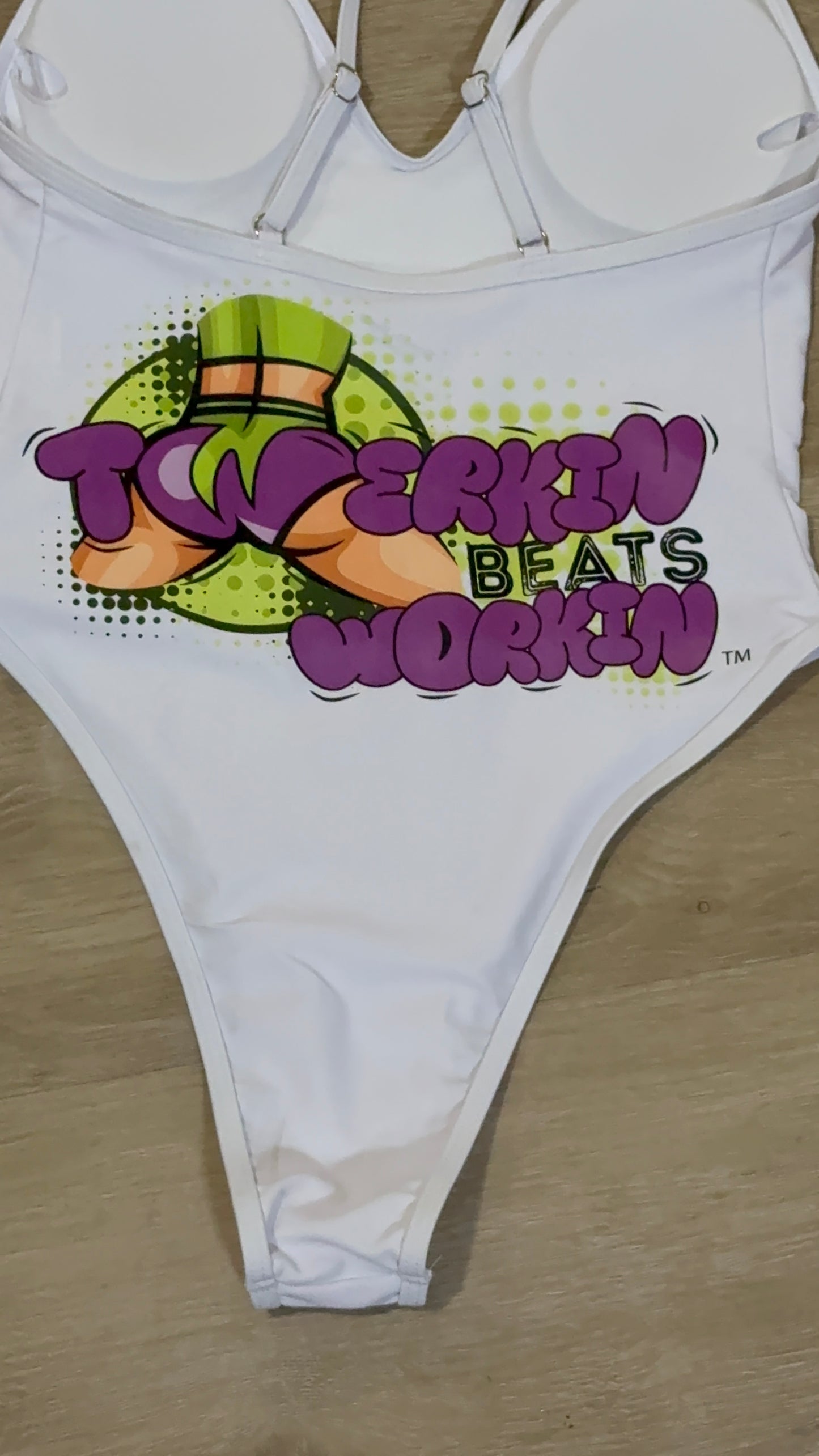 Purple and green booty designed Twerkin’ Beats Workin’ one piece