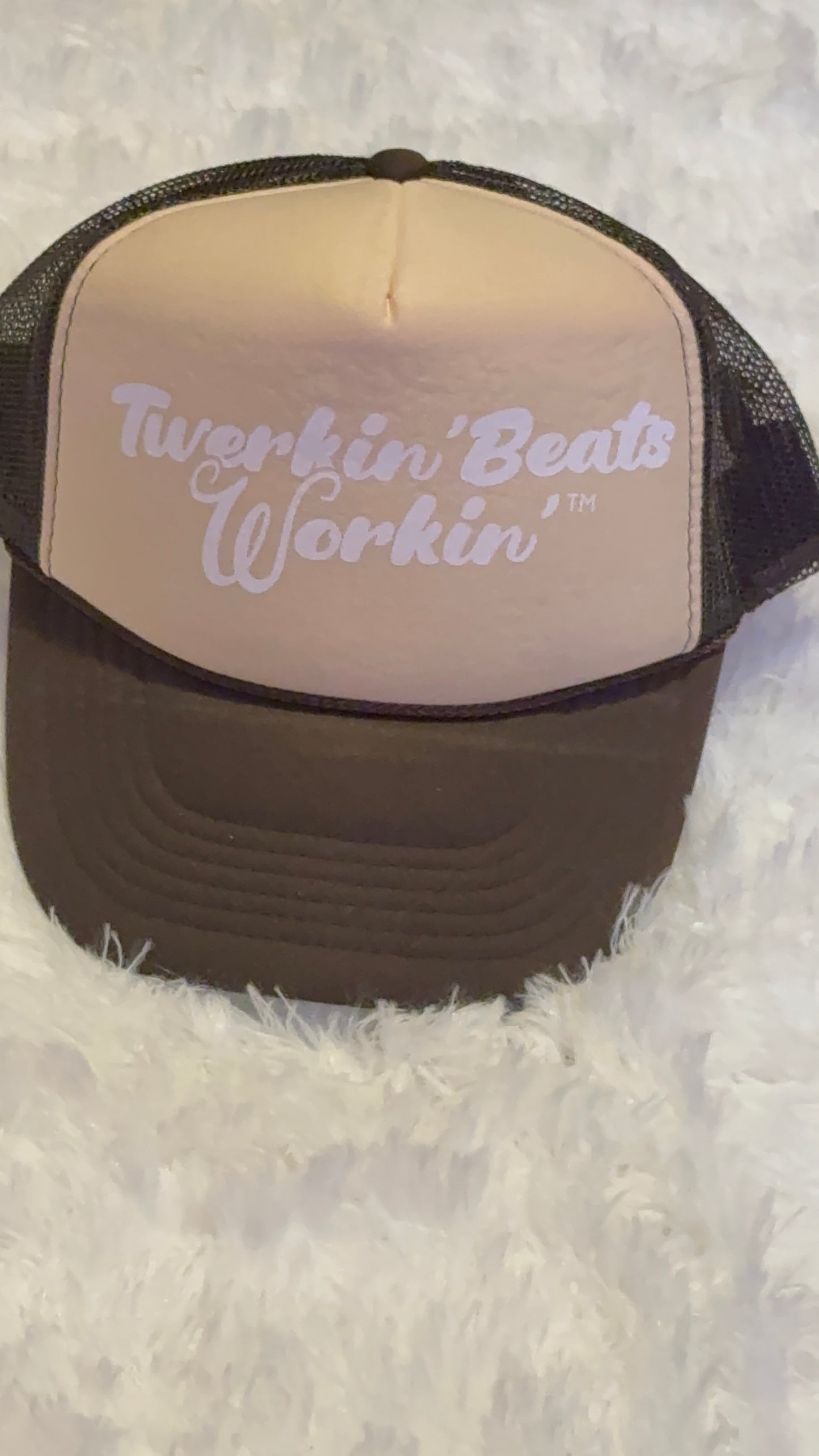 Tan and brown hat with white Twerkin’ Beats Workin’ logo