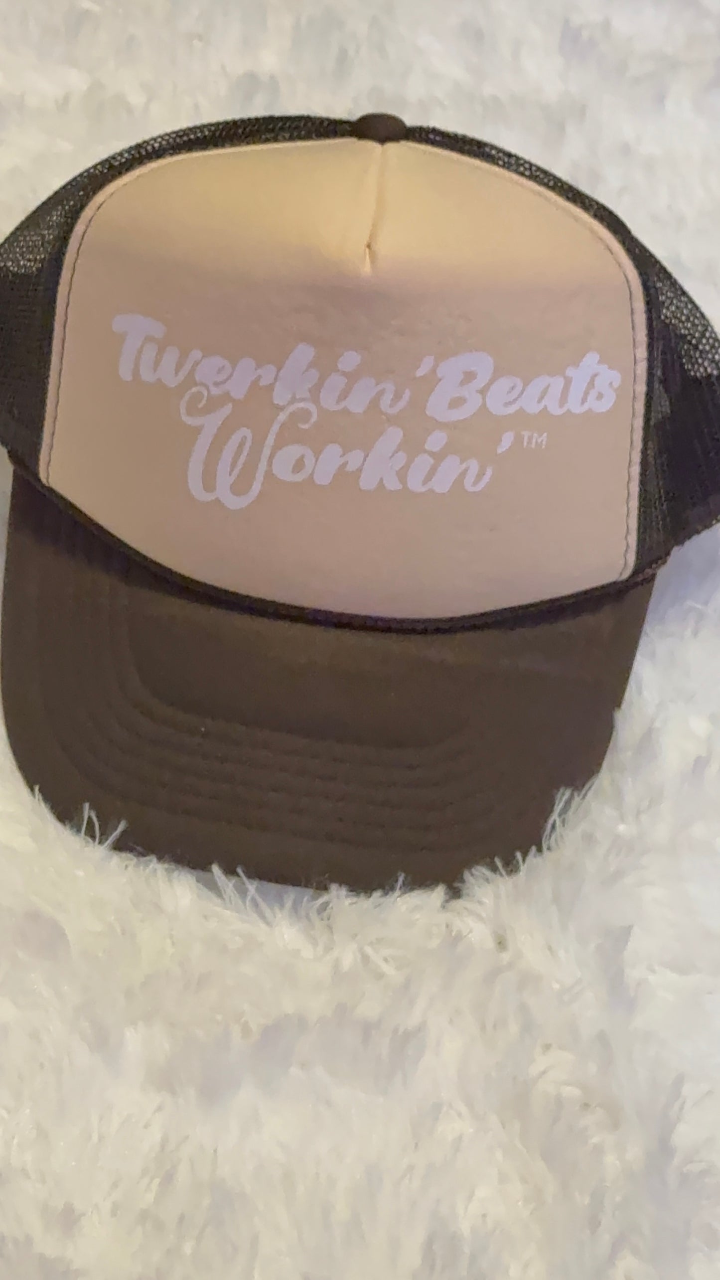 Tan and brown hat with white Twerkin’ Beats Workin’ logo