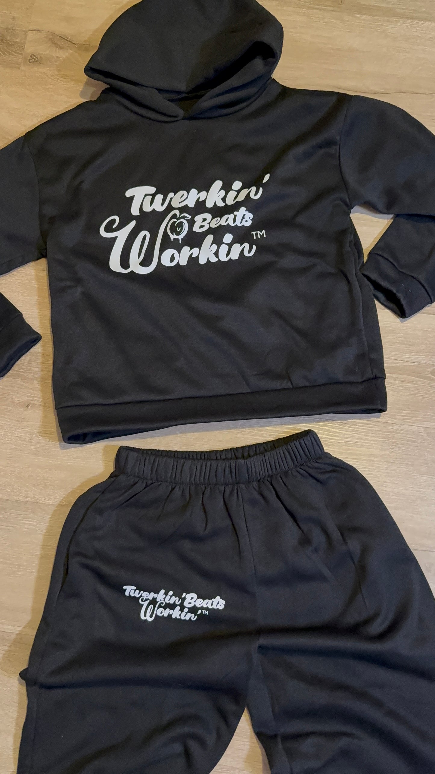 Black Unisex Twerkin’ Beats Workin’ peach design front of hoodie back of pants jogger set