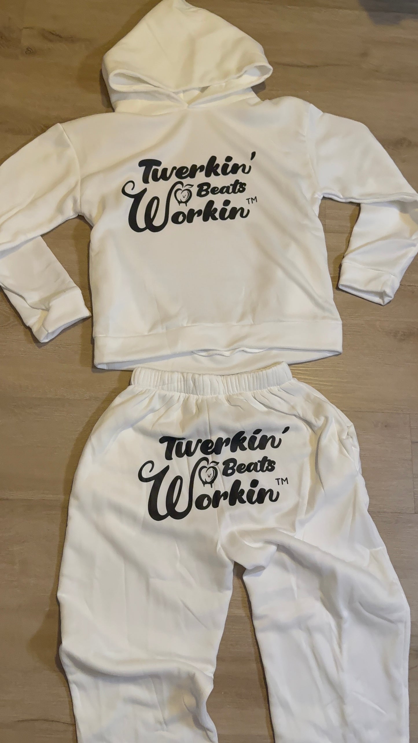 Unisex white Twerkin’ Beats Workin’ peach design on front of hoodie and back of pants Jogger set