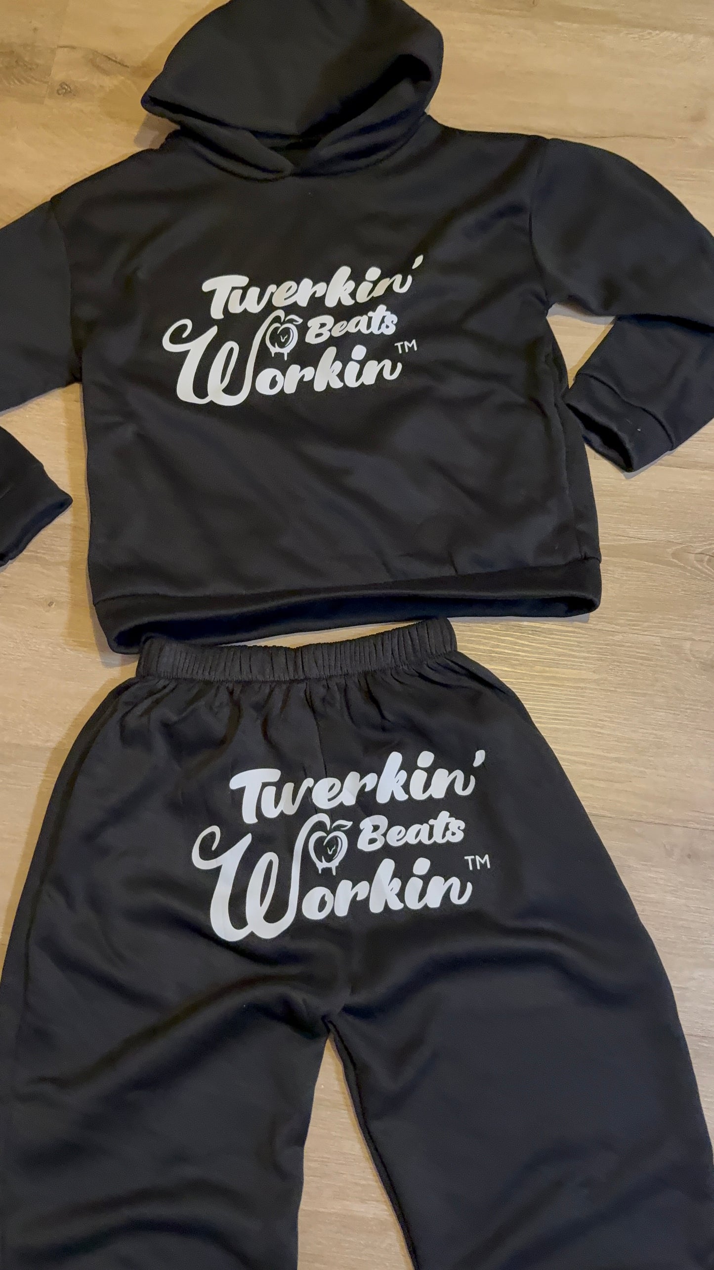Black Unisex Twerkin’ Beats Workin’ peach design front of hoodie back of pants jogger set