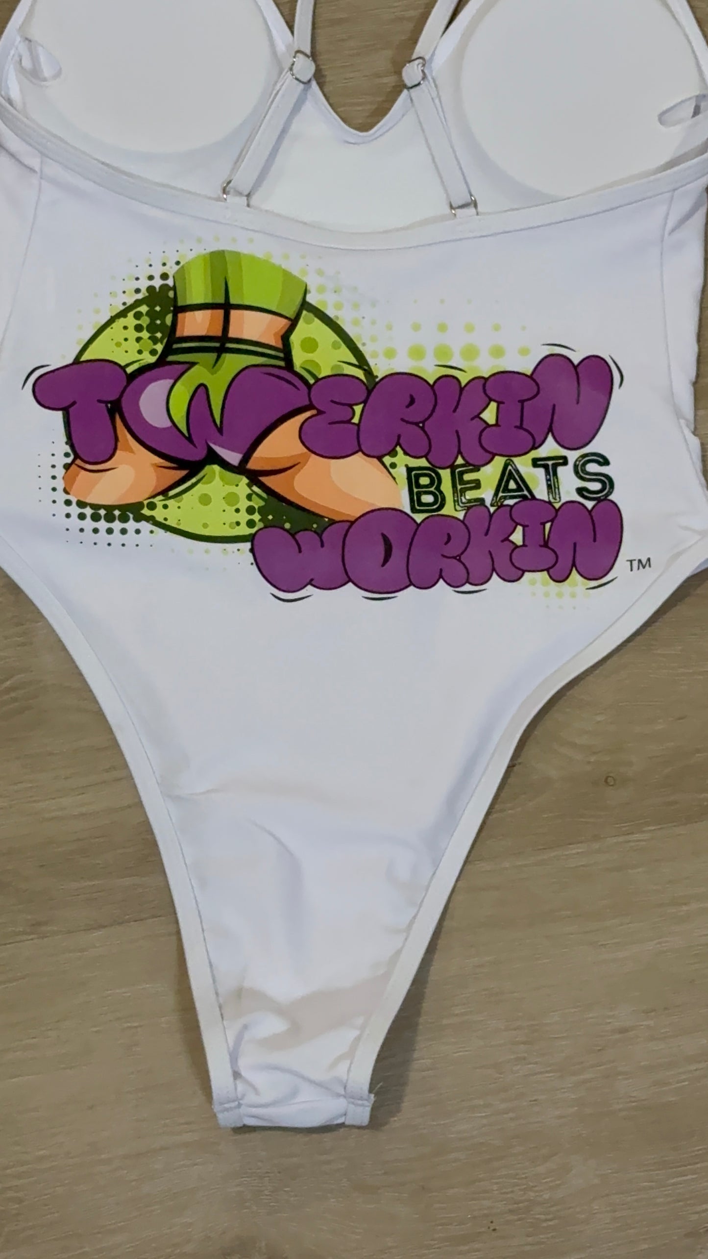 Purple and green booty designed Twerkin’ Beats Workin’ one piece