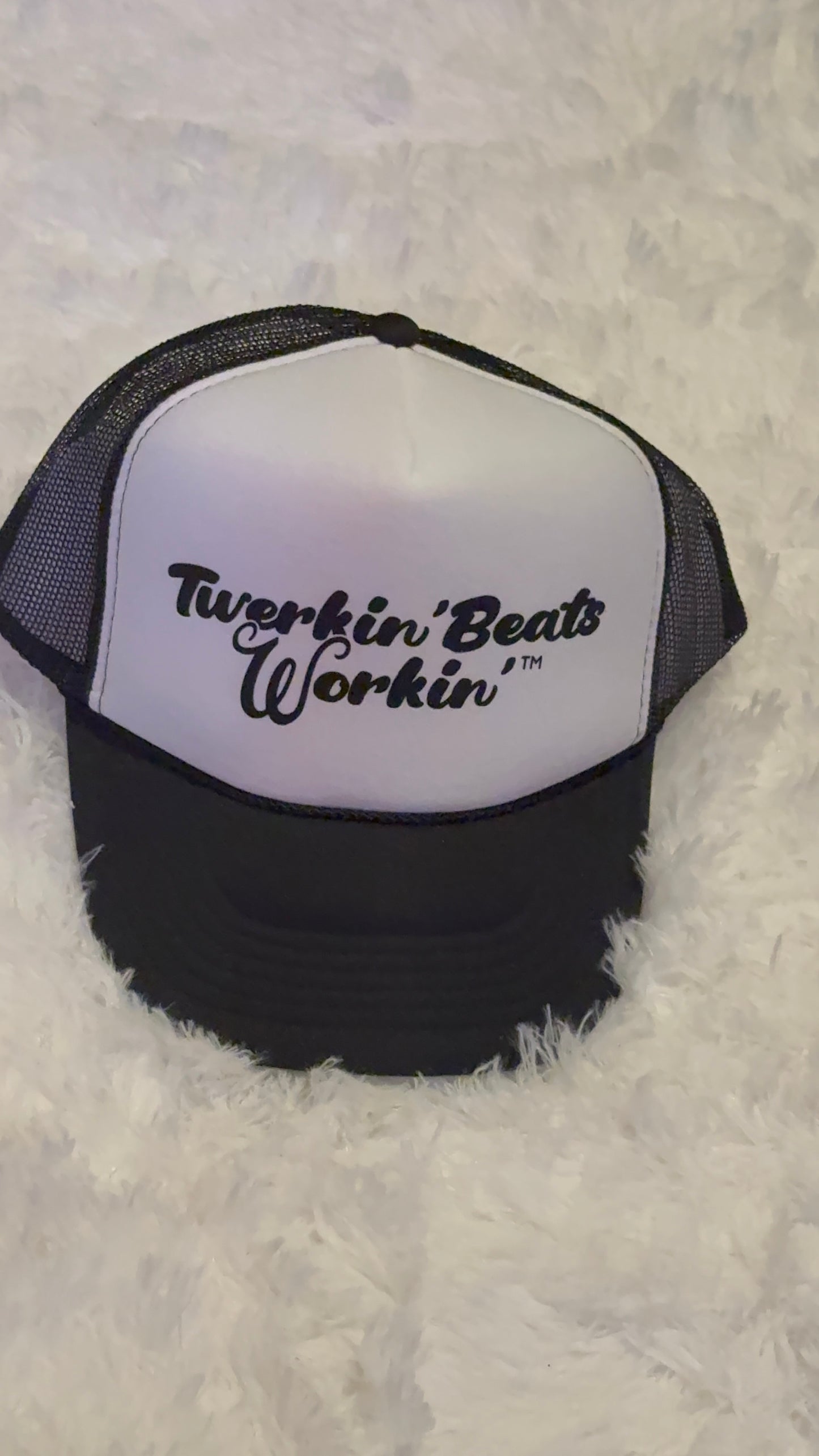 White and black hat with black Twerkin’ Beats Workin’ logo