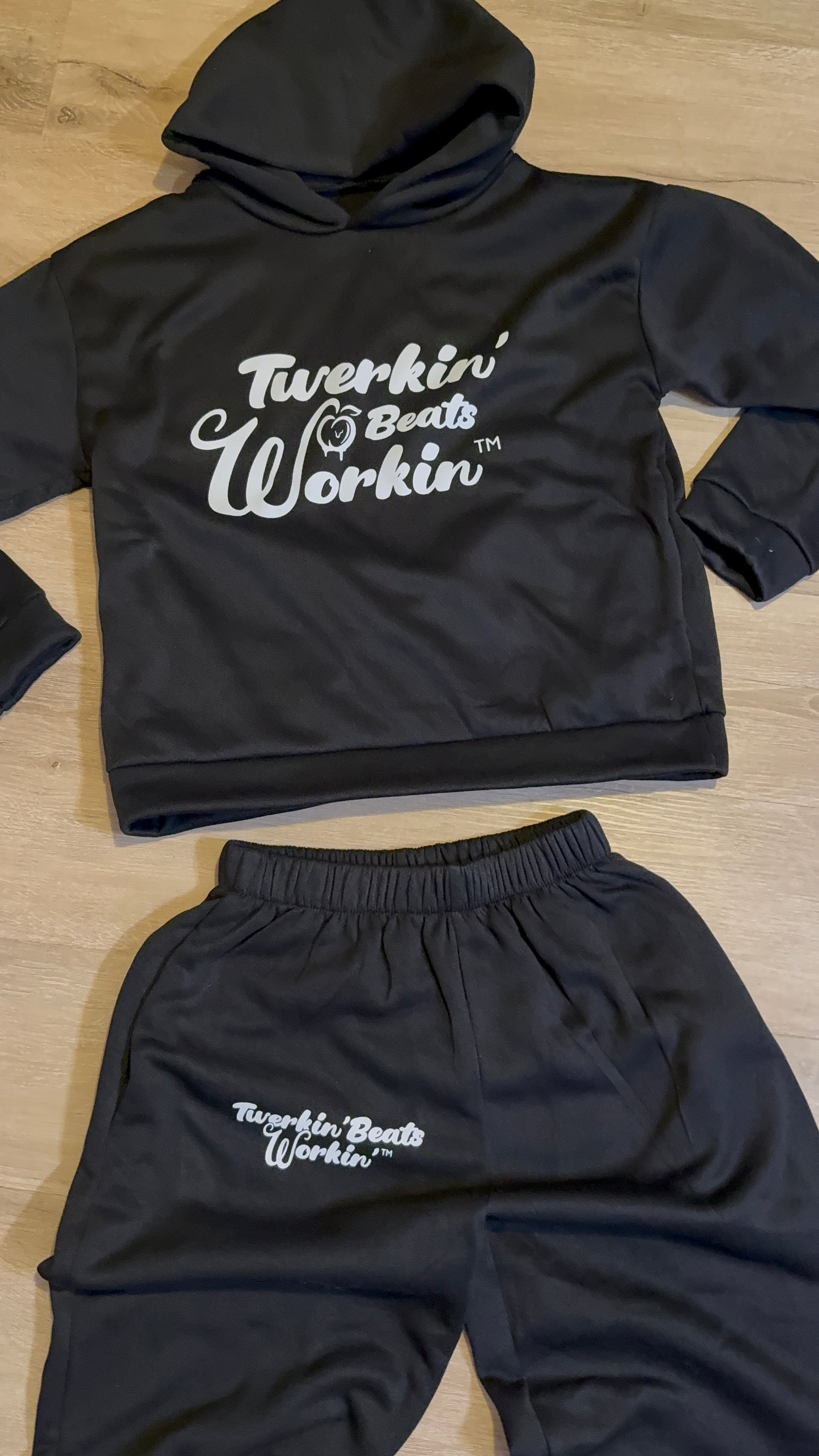 Black Unisex Twerkin’ Beats Workin’ peach design front of hoodie back of pants jogger set