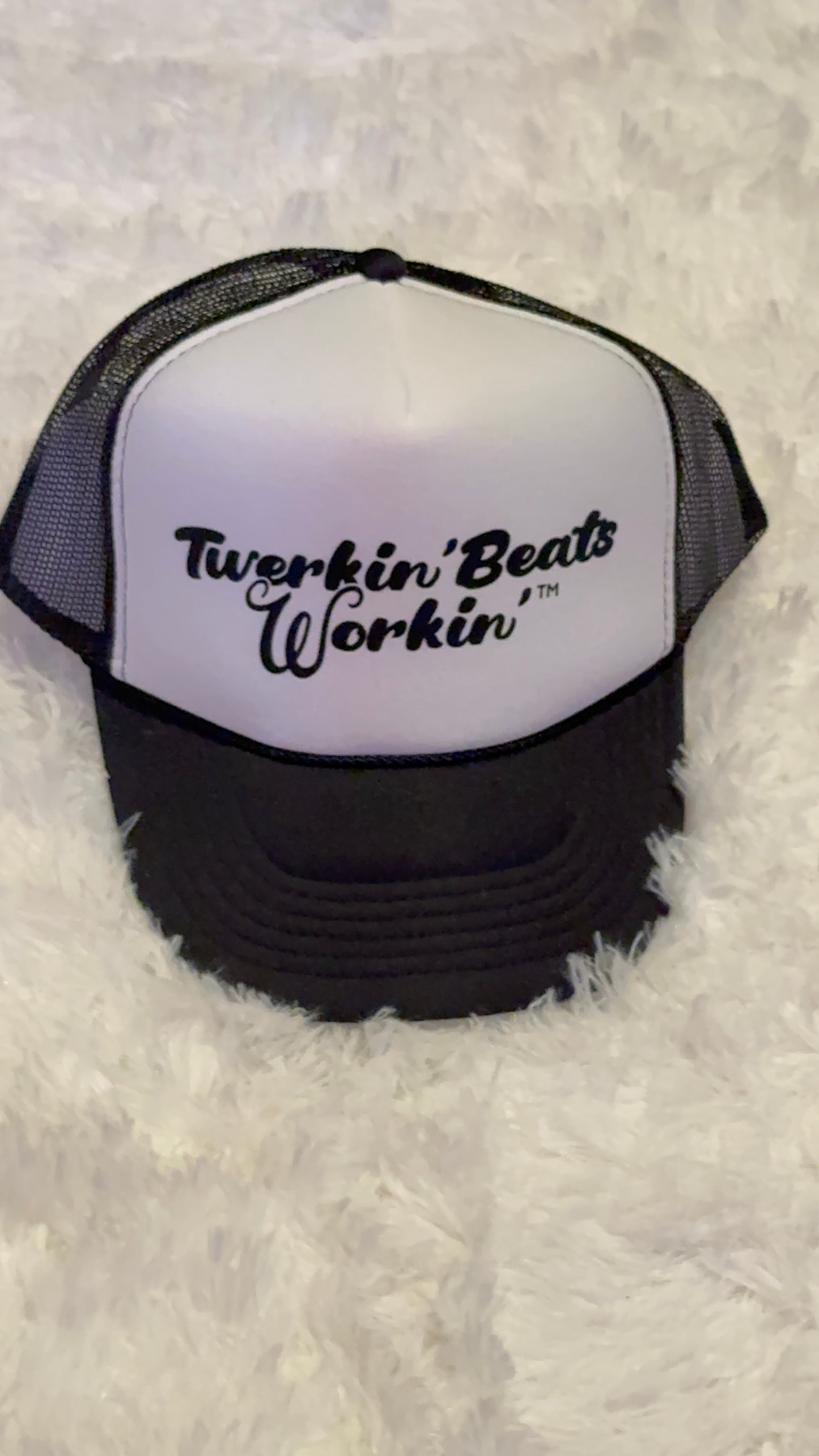 White and black hat with black Twerkin’ Beats Workin’ logo