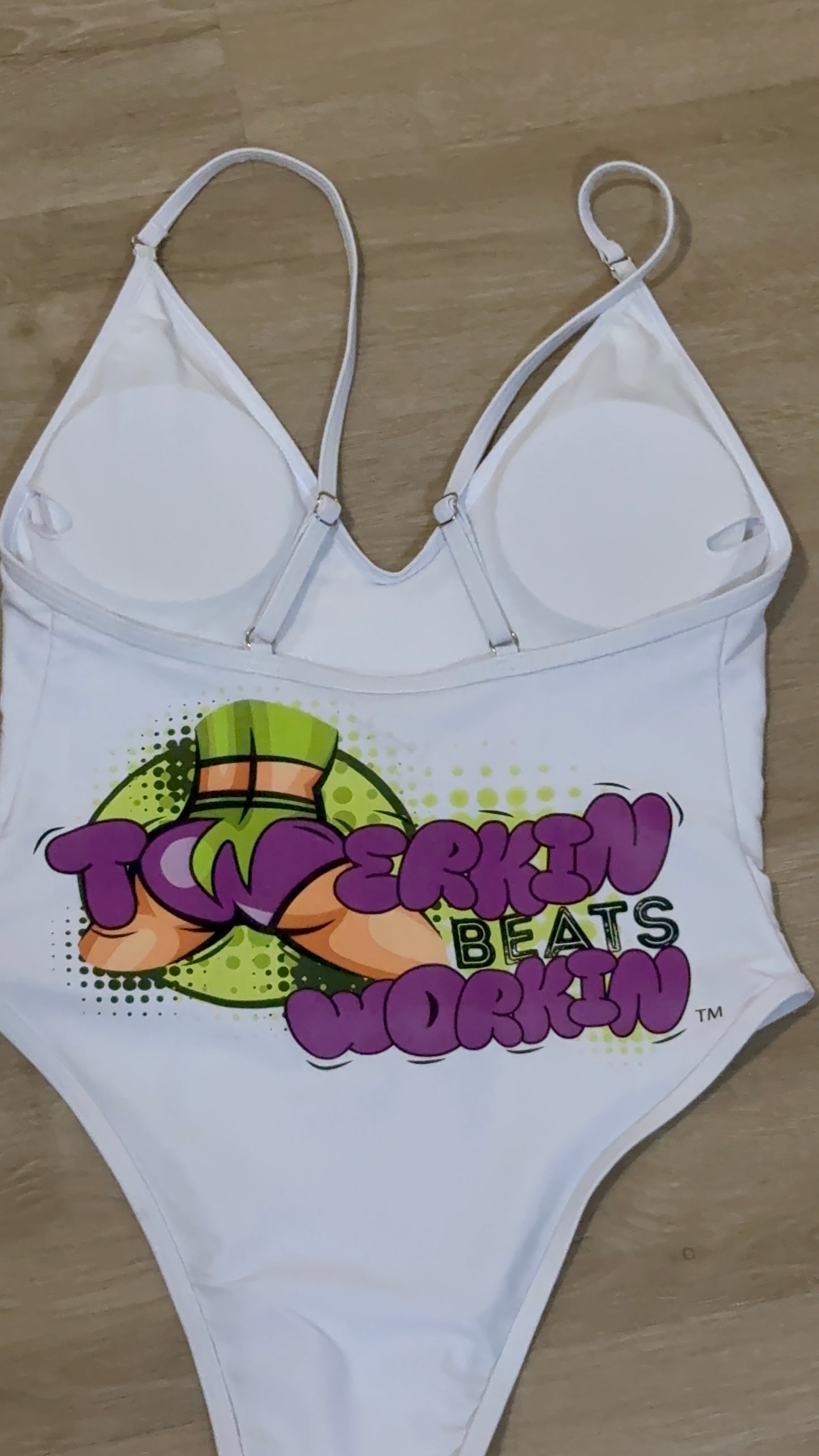 Purple and green booty designed Twerkin’ Beats Workin’ one piece