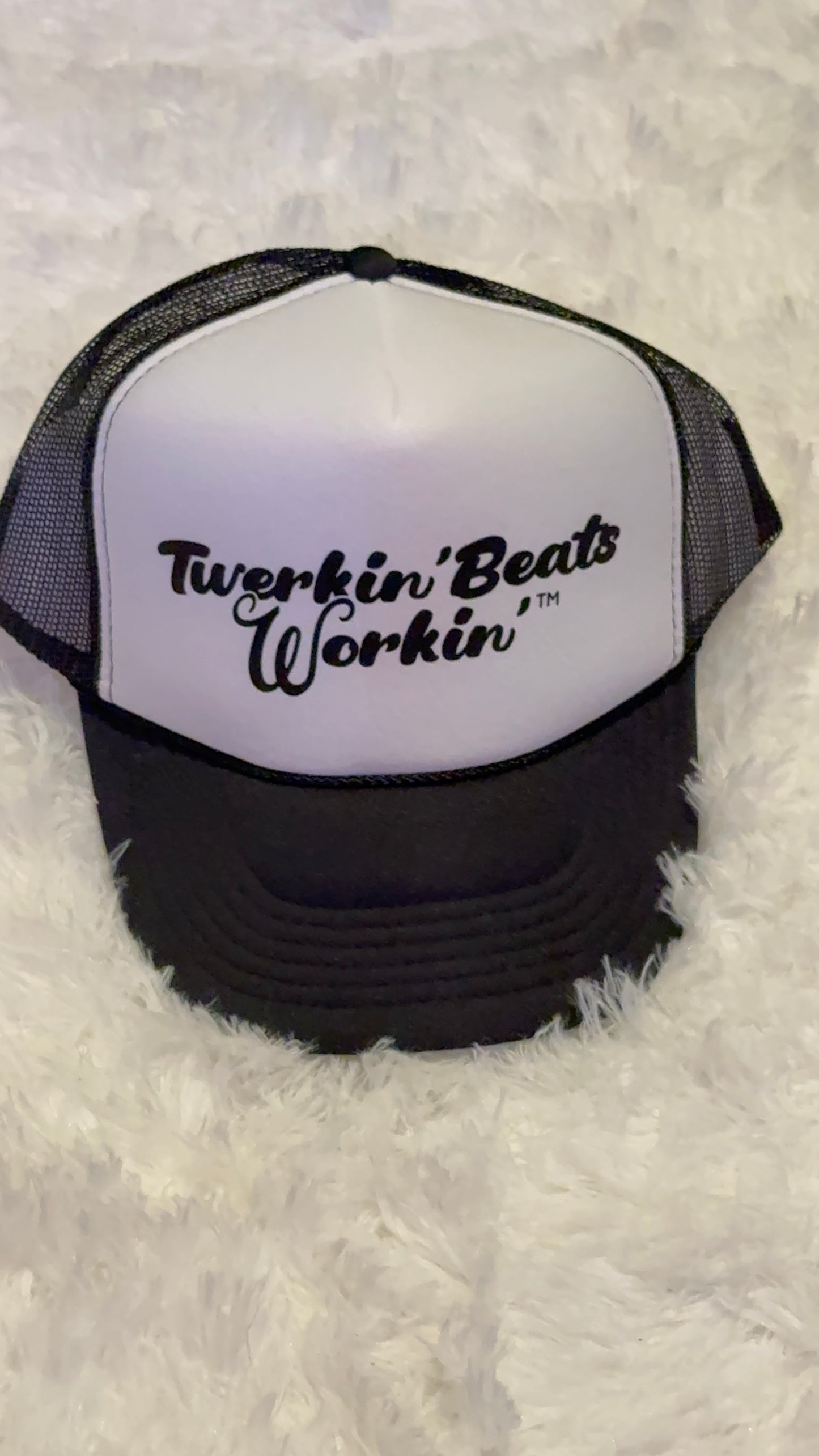 White and black hat with black Twerkin’ Beats Workin’ logo